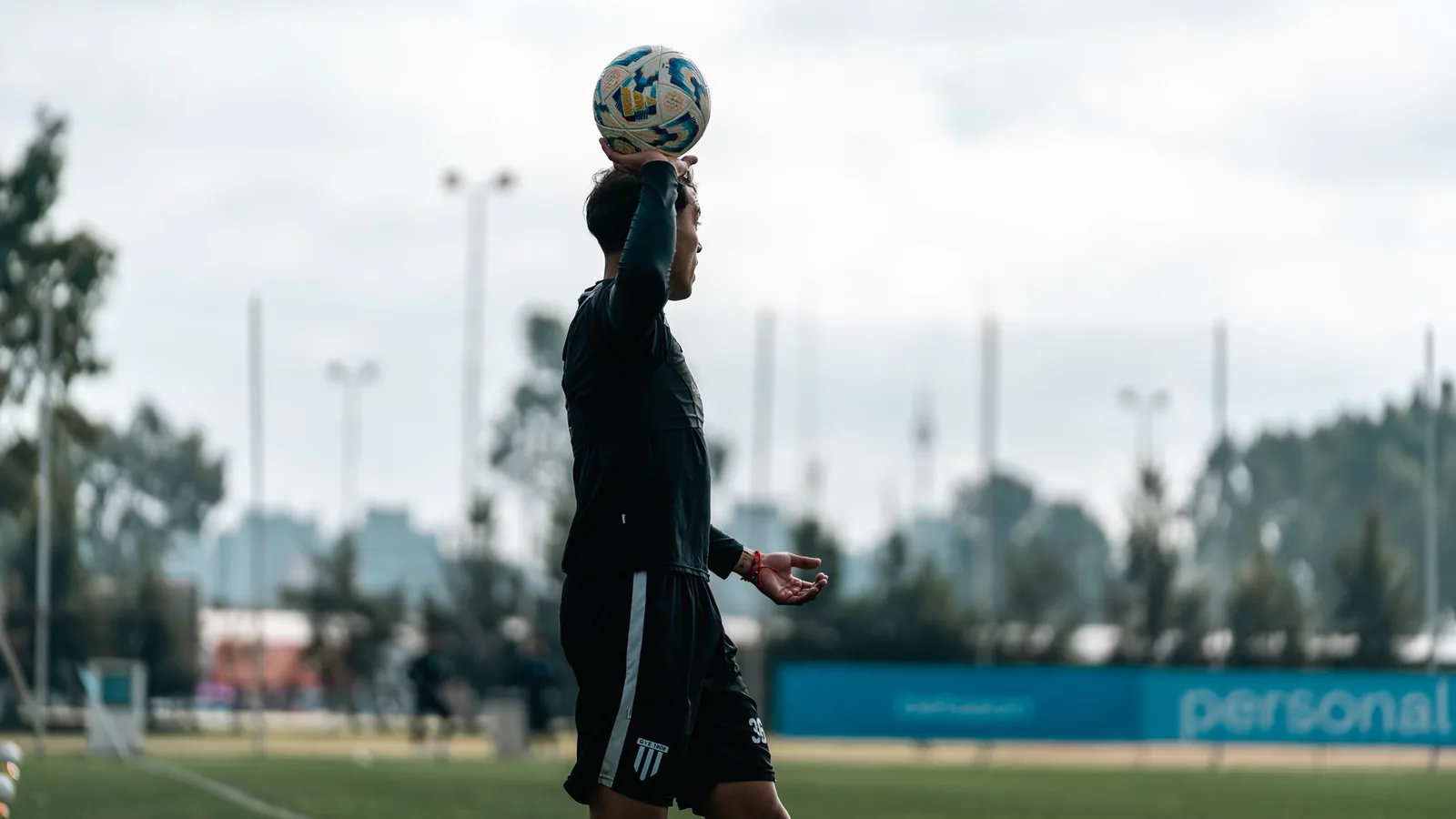 Quarterback preparing a throw at practice